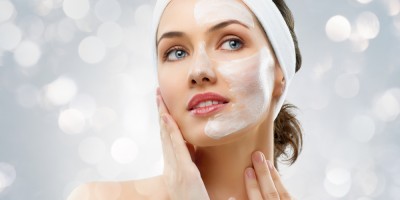 Beauty women getting facial mask
